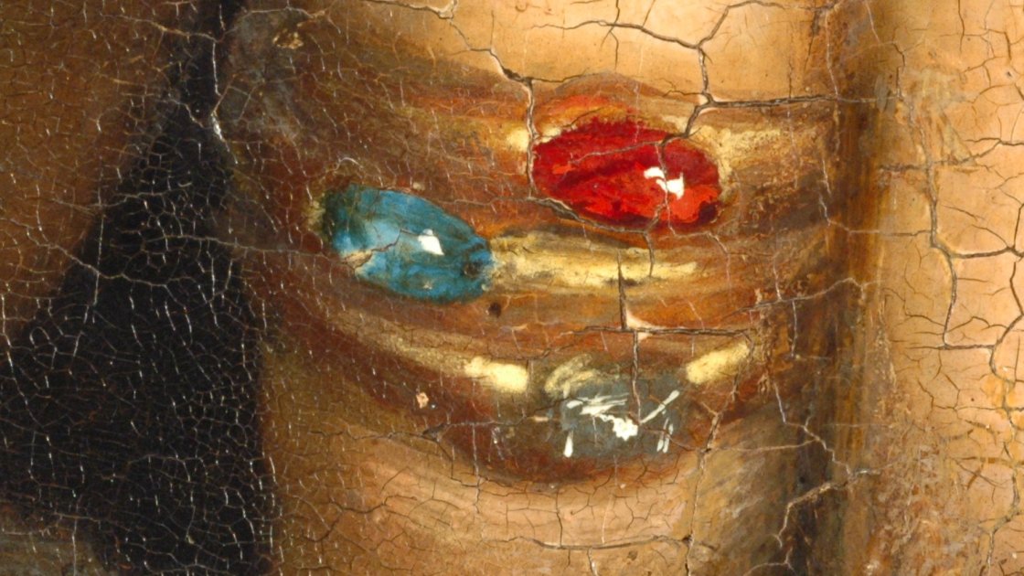 Detalle en macrofotografía de la obra "Retrato de Matthäus Schwarz" de Amberger   