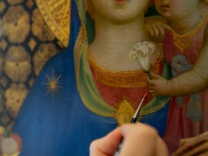 Detail of the painting restoration process 