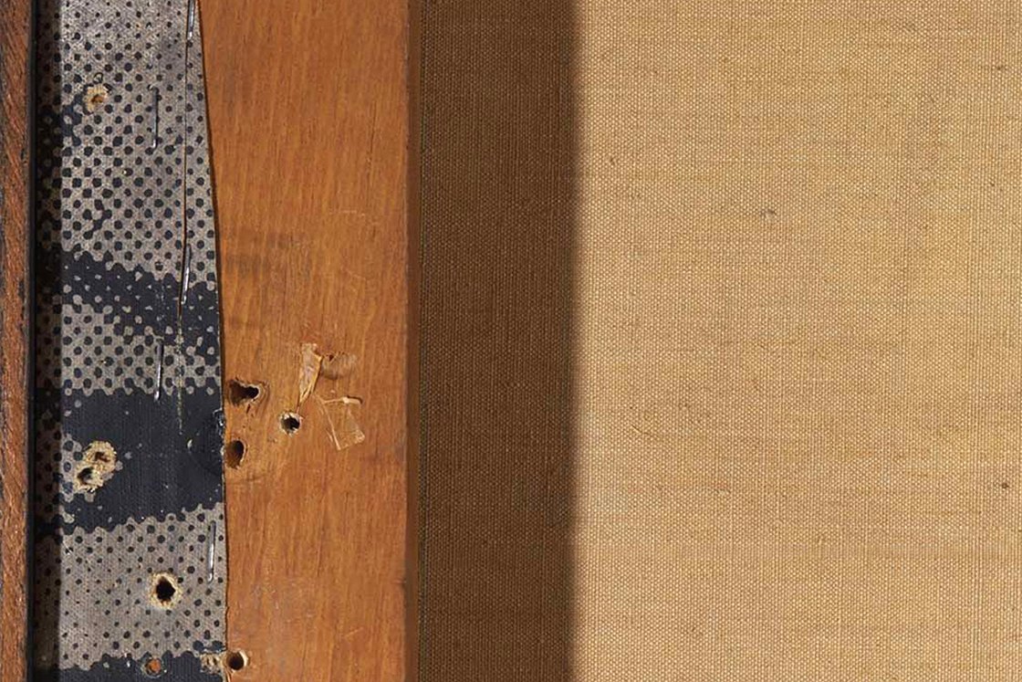 Detail of the edge of the canvas, folded and stapled to the stretcher, from Robert Rauschenberg’s work “Express”