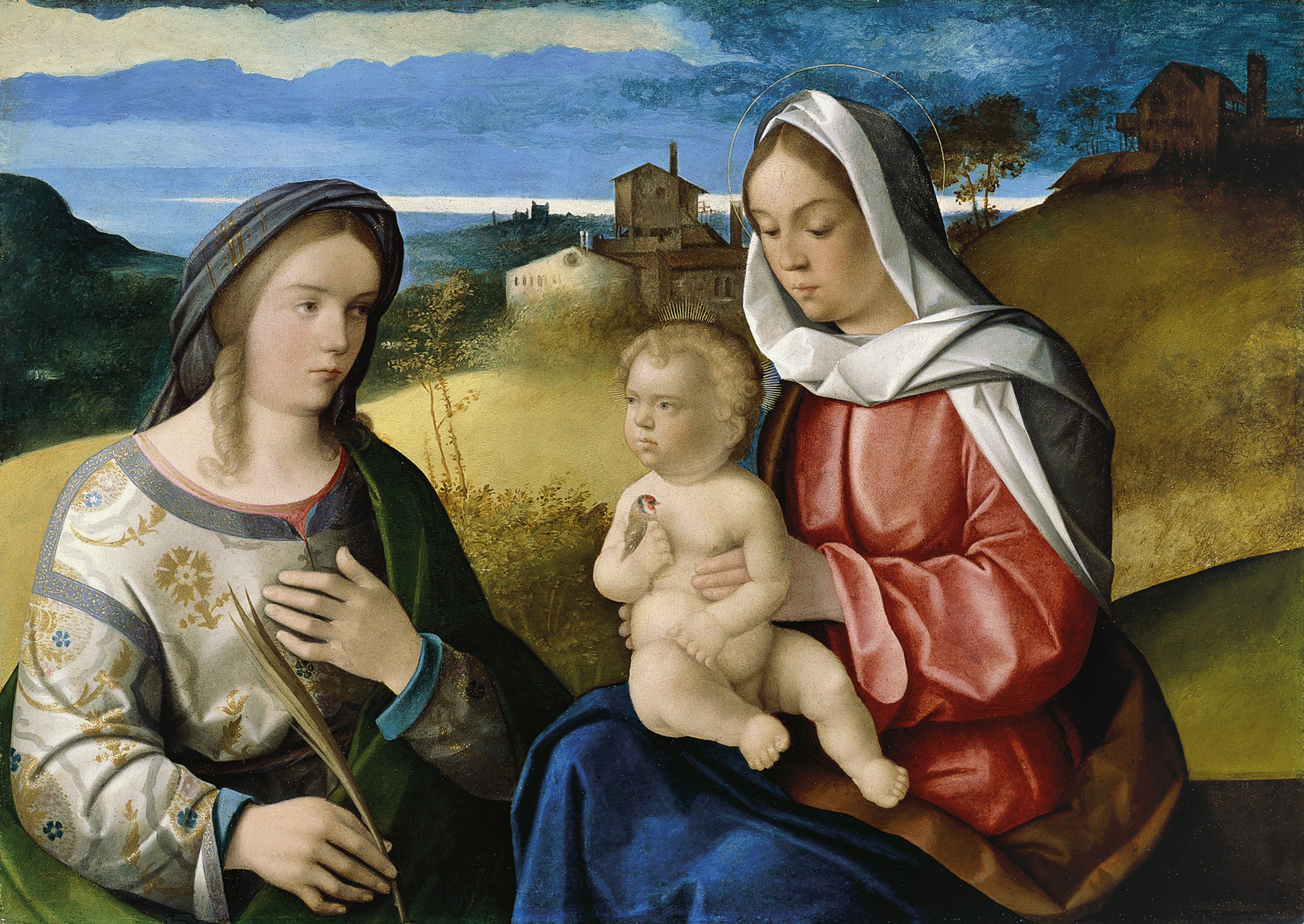 The Virgin and Child with Saint Agnes in a Landscape. La Virgen y el Niño, con santa Inés, en un paisaje, c. 1520-25