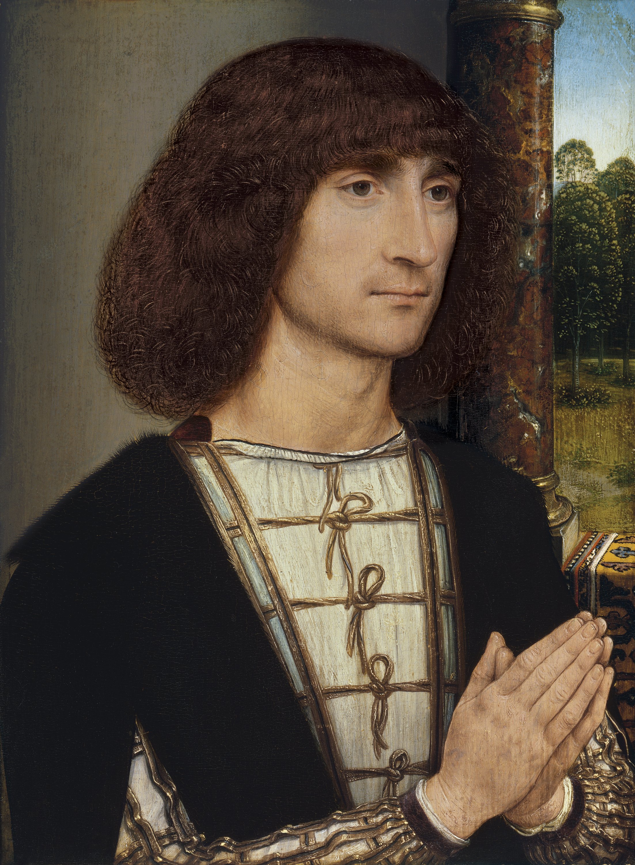 Retrato de un hombre joven orante (anverso). Hans Memling