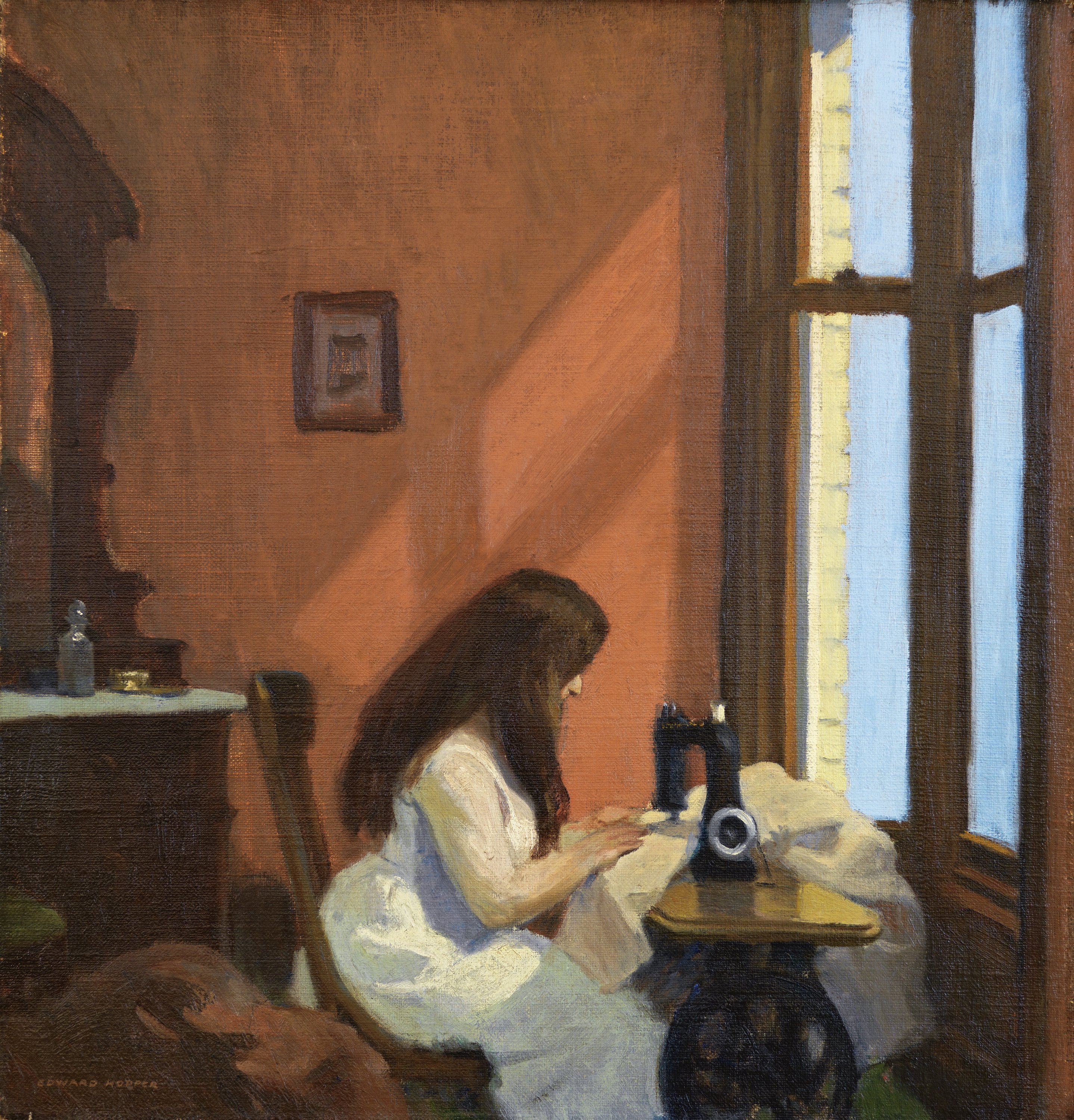 Girl at a Sewing Machine. Muchacha cosiendo a máquina, c. 1921