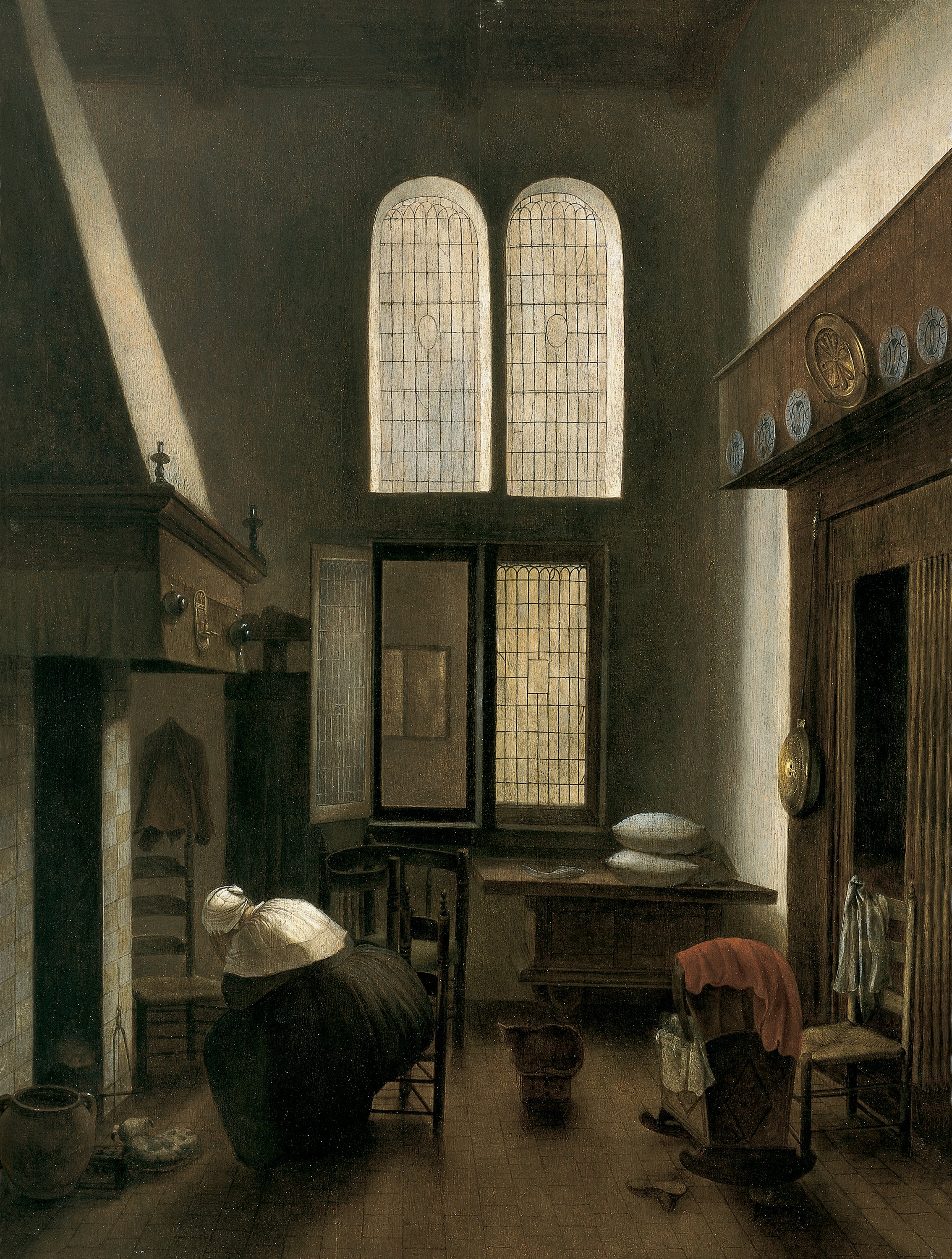 Interior with a Woman Seated by a Hearth. Interior con una mujer sentada junto al hogar, c. 1654