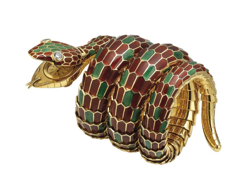 Serpenti bracelet-watch in gold with red and green enamel and diamonds, ca. 1965. Bulgari Heritage Collection