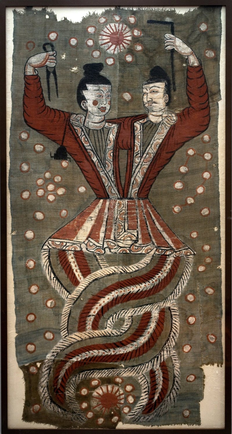 Fuxi y Nüwa, los creadores del mundo según la mitología china; pintura sobre seda hallada en las tumbas.