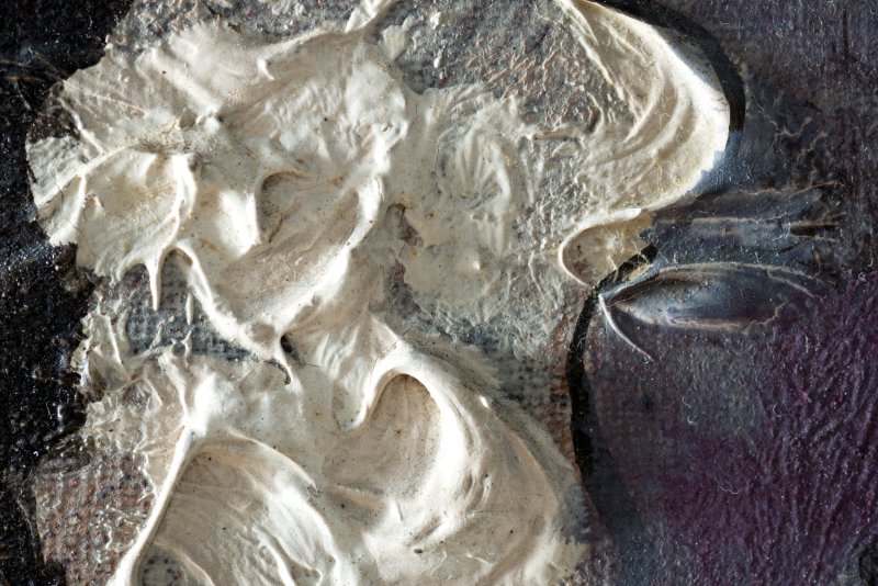 Macro-photographic detail of the costume of the painting Harlequin with Mirror, by Picasso.