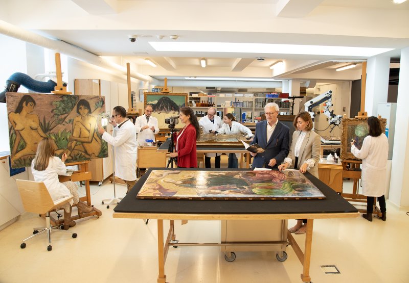 Restoration team performing different works