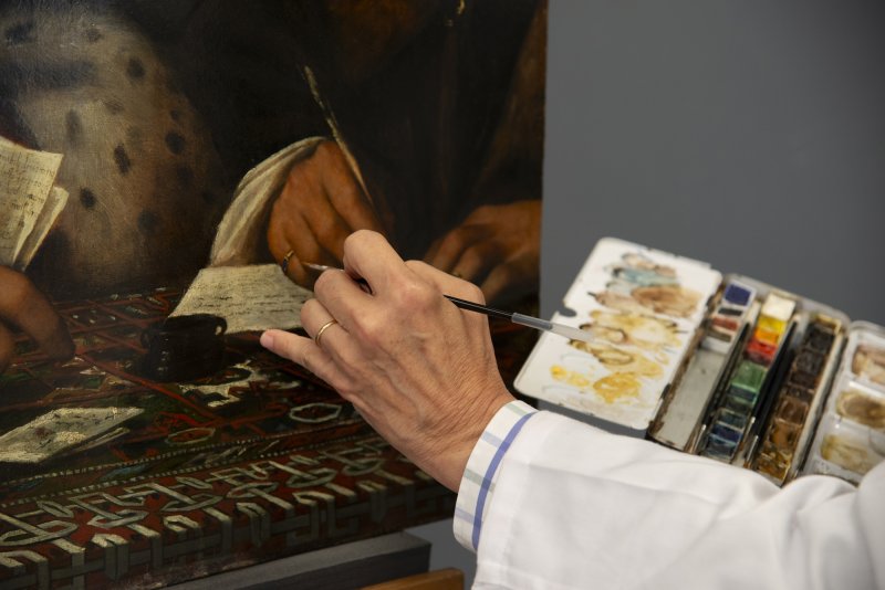 Detail of the reintegration process of an artwork