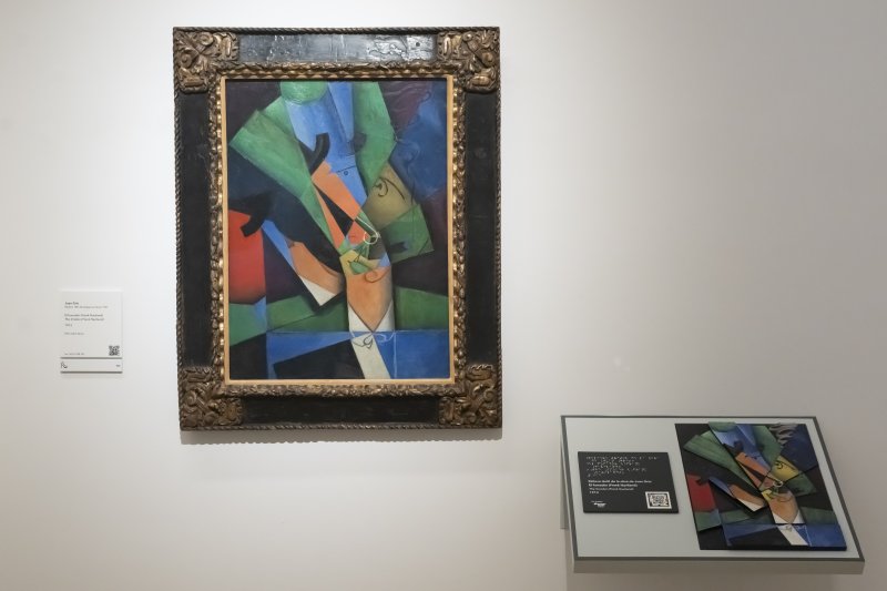 Relieve para la exploración táctil Relieve para la exploración táctil basado en la obra 'El fumador (Frank Haviland)' de Juan (José Victoriano González Pérez) Gris