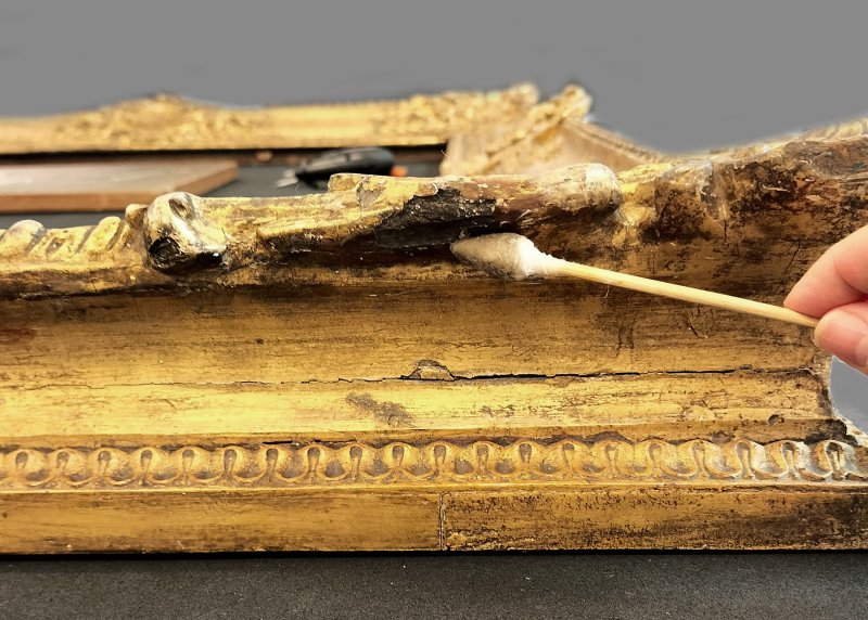 Detail of the restoration process of the frame of Rubens’s “Venus and Cupid”